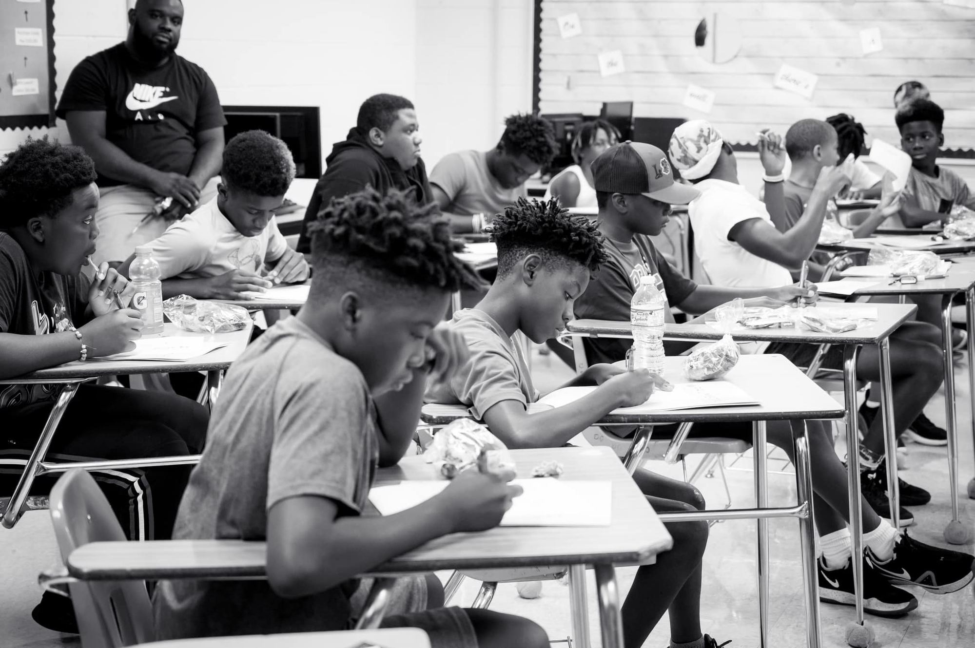 Young men at work during a DDG session